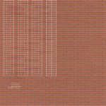 Brick and Metal Fence with Ornamental Ironwork