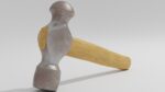 Hammer with wooden handle