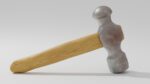 Hammer with wooden handle