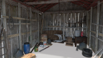Old wooden garage with materials