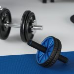 Sports set two dumbbells on mat