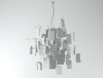 Zettelz 5 light fixture with paper hanging from it